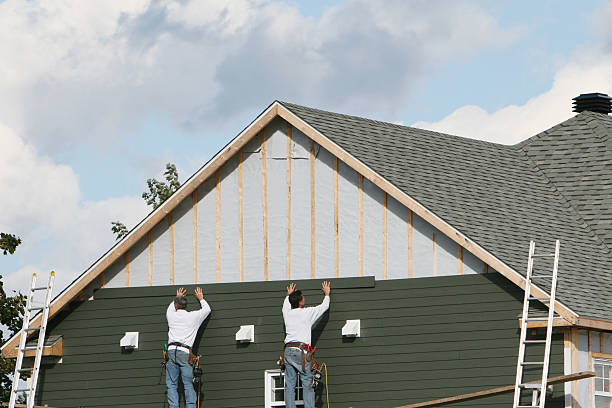 Professional Vinyl Siding technician working in Powhatan Point, OH
